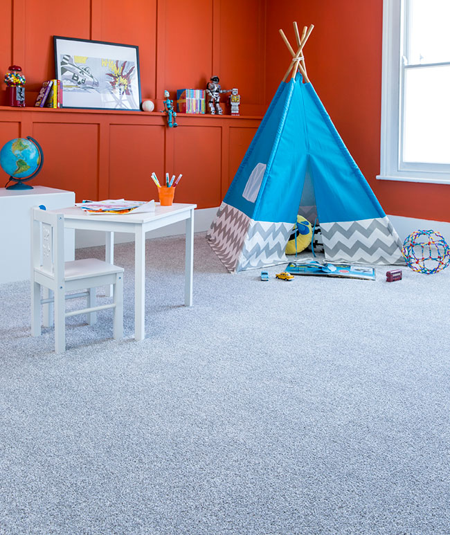 Blue Cormar Elite carpet in children's room with red walls and wigwam